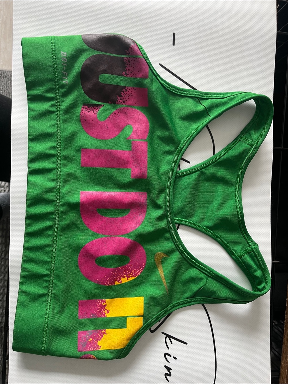 Nike Women's Green Sports Bra with Pink and Yellow 'JUST DO IT' Print